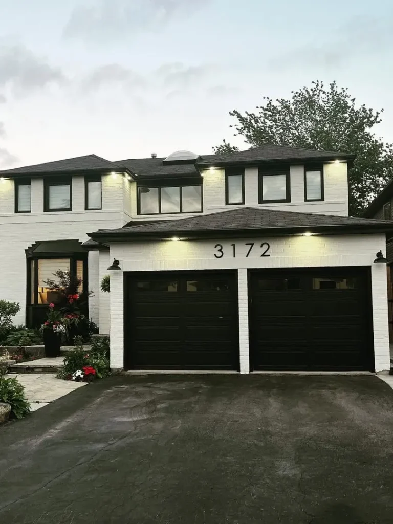 Classic White Brick Exterior with Bold Black Trim