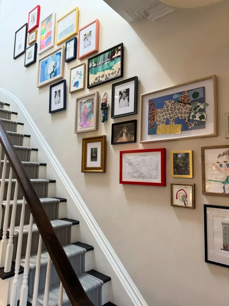 Colorful Staircase Gallery Wall With Kids Artwork