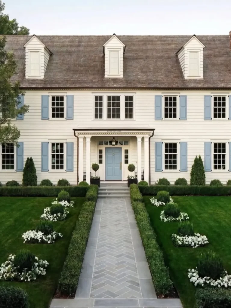Cream Exterior with Light Blue Shutters for Colonial Charm