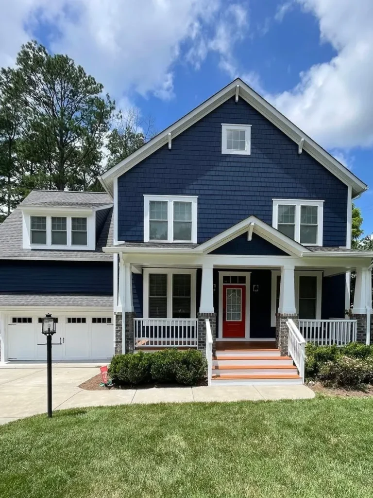 Dark Blue Family Home With Red Front Door