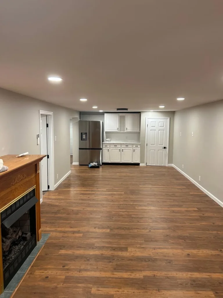 Light Taupe Basement with White Built-In Cabinets