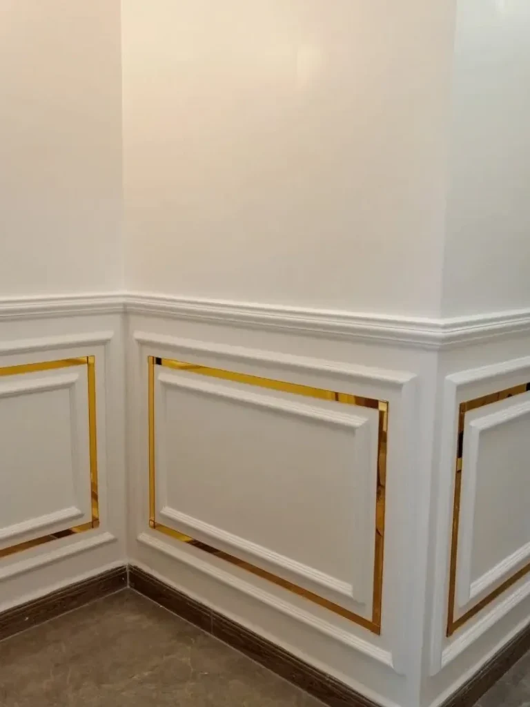 Luxury Wainscoting With Gold Trim Accents