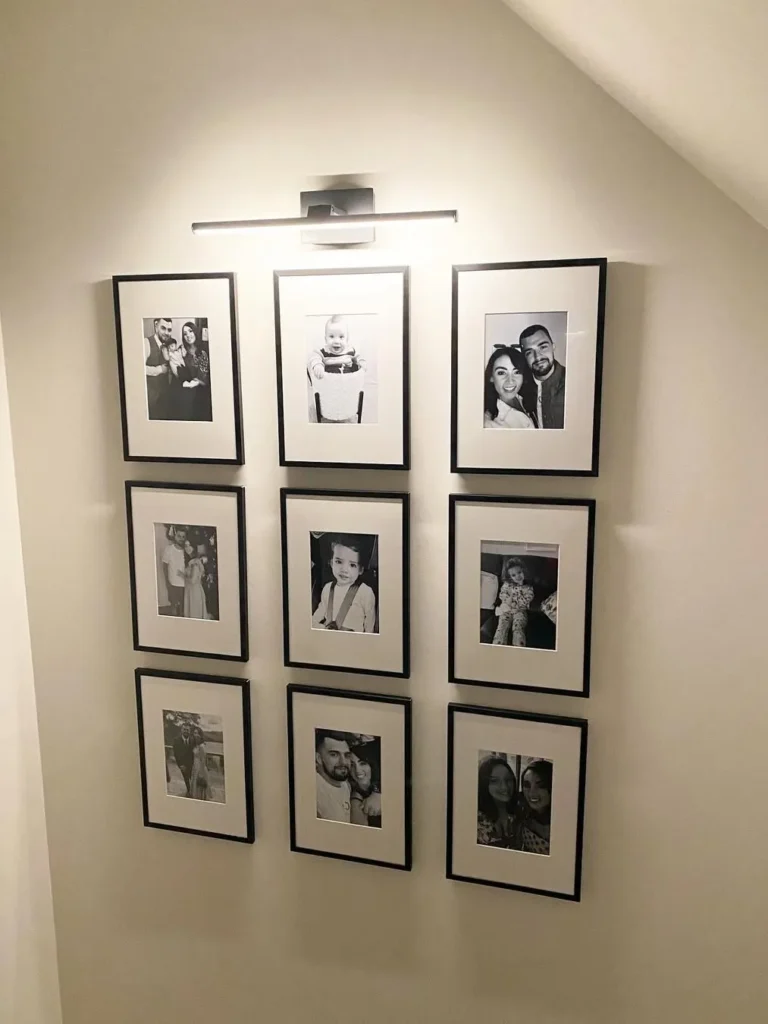 Minimal Family Photo Wall With Picture Lights