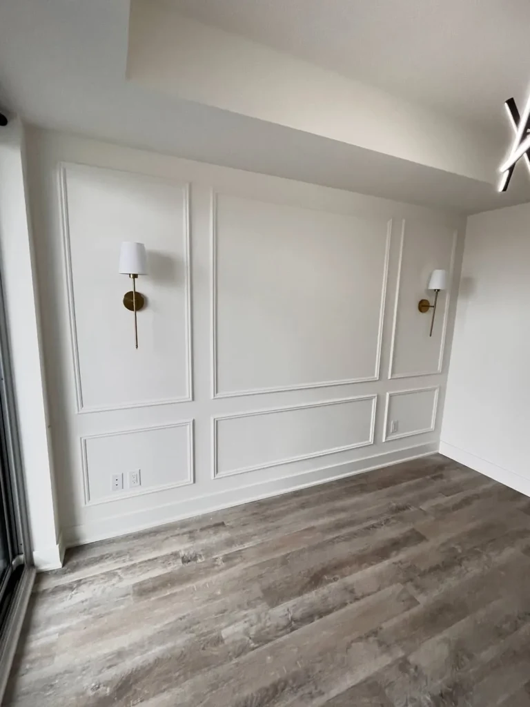Modern Picture Frame Wainscoting With Wall Sconces