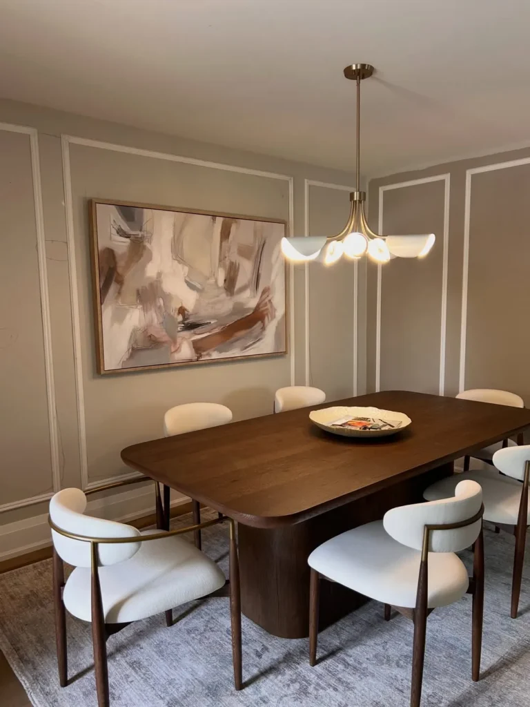 Neutral Dining Room Wall Molding With Abstract Art