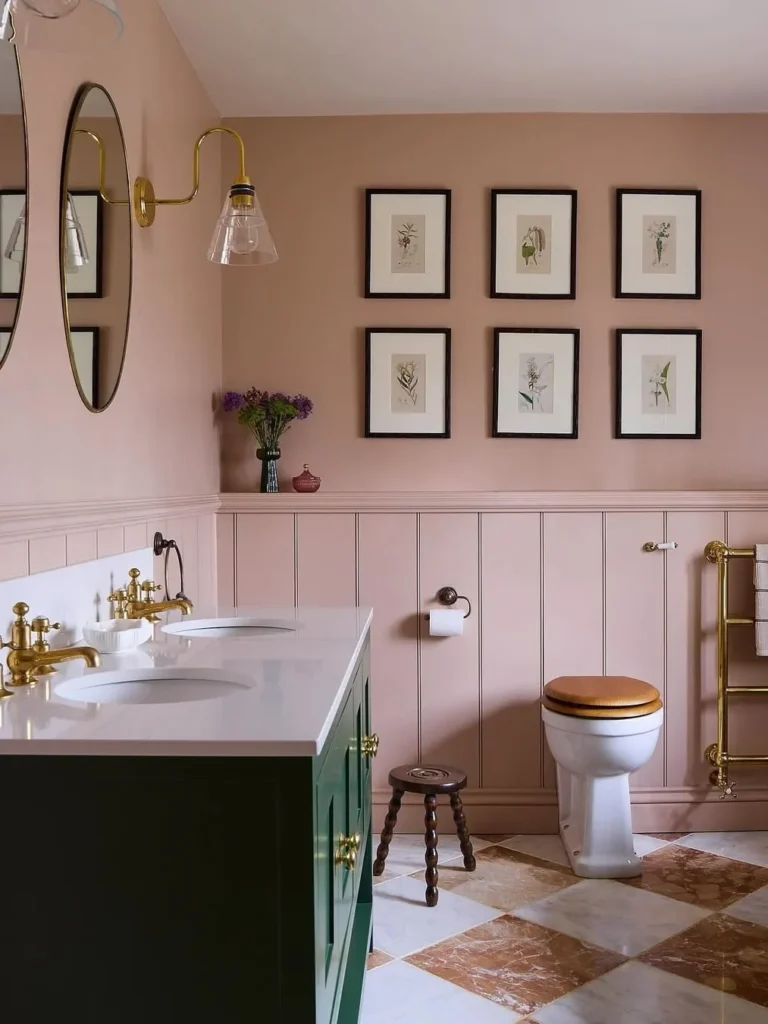 Pink Wainscoting Bathroom With Brass Fixtures