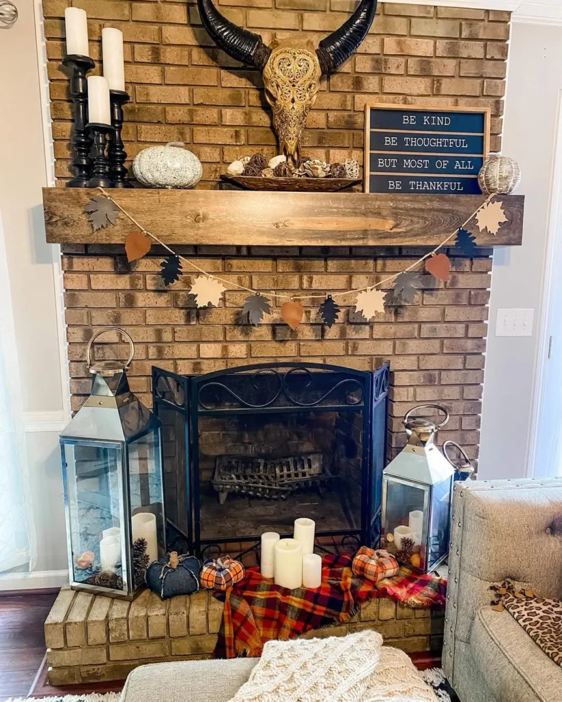 Rustic Brick Fall Fireplace With Plaid and Lantern Decor