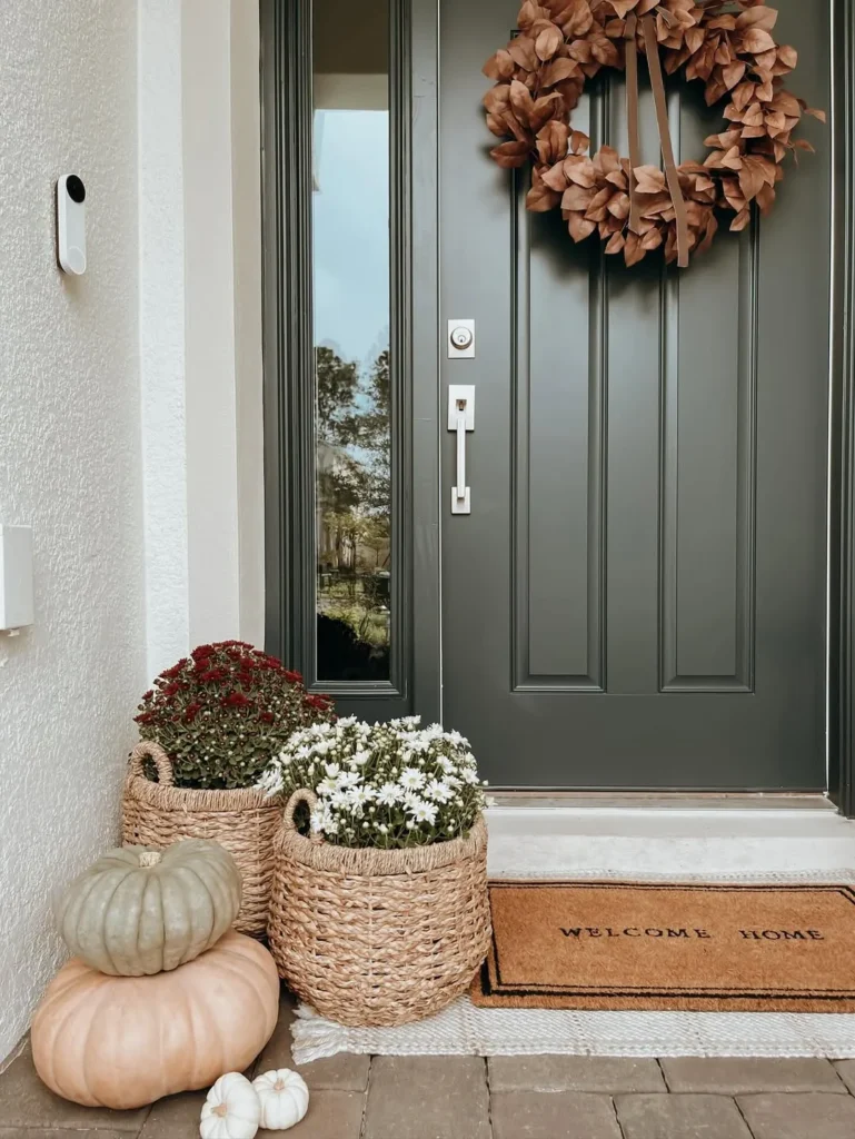 Simple Black Door Decor With Mums and Pumpkins