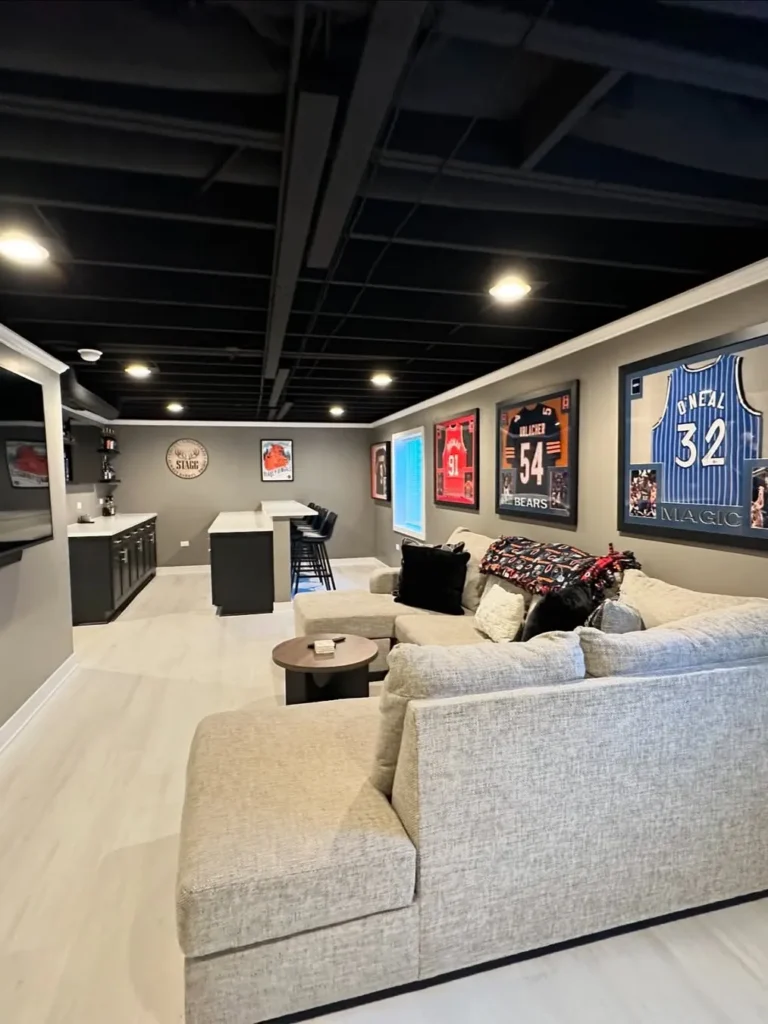 Warm Gray Basement with a Sports Lounge
