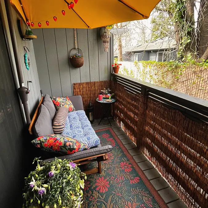Colorful Balcony Lounge With Bamboo Privacy