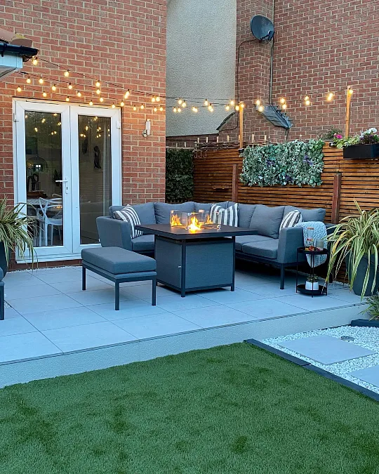 Fire Table Patio With Privacy Greenery