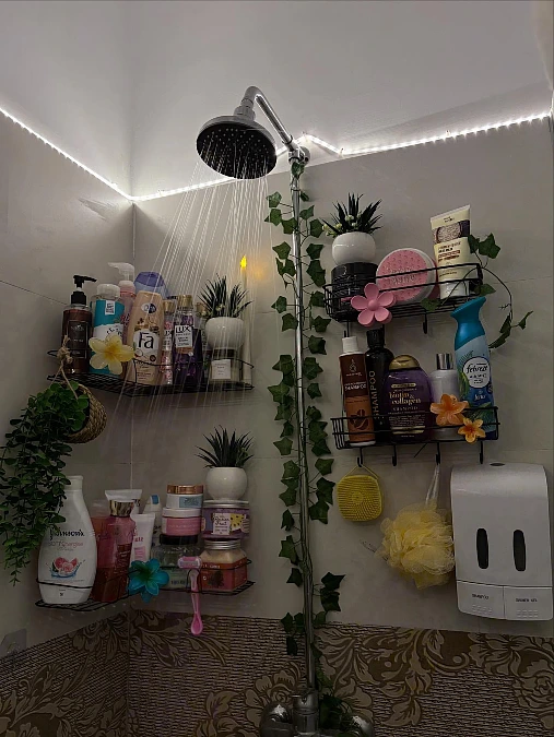 Shower Shelves with Greenery and Soft Lighting