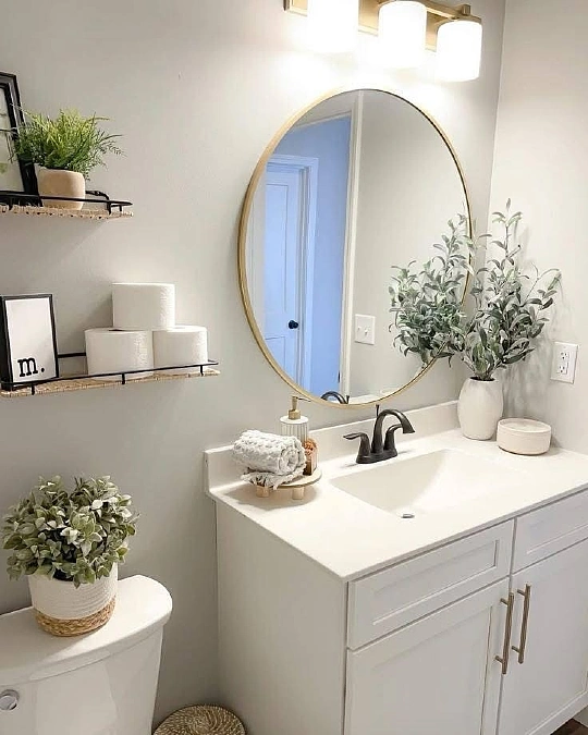 Oval Brass Mirror with Floating Shelf Storage