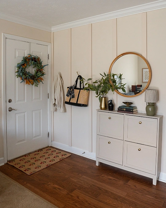 Soft Cream Entryway with Brass Accents